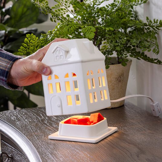 Porcelain House Canopy Wax Melt Warmer detail shot showing warm glow by Beverly's Candle Company