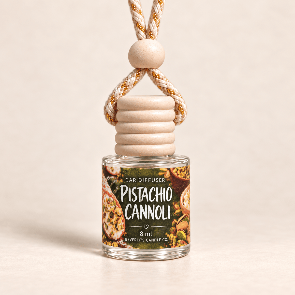 Pistachio Cannoli 8 ml car diffuser by Beverly's Candle Co. on a warm cream background