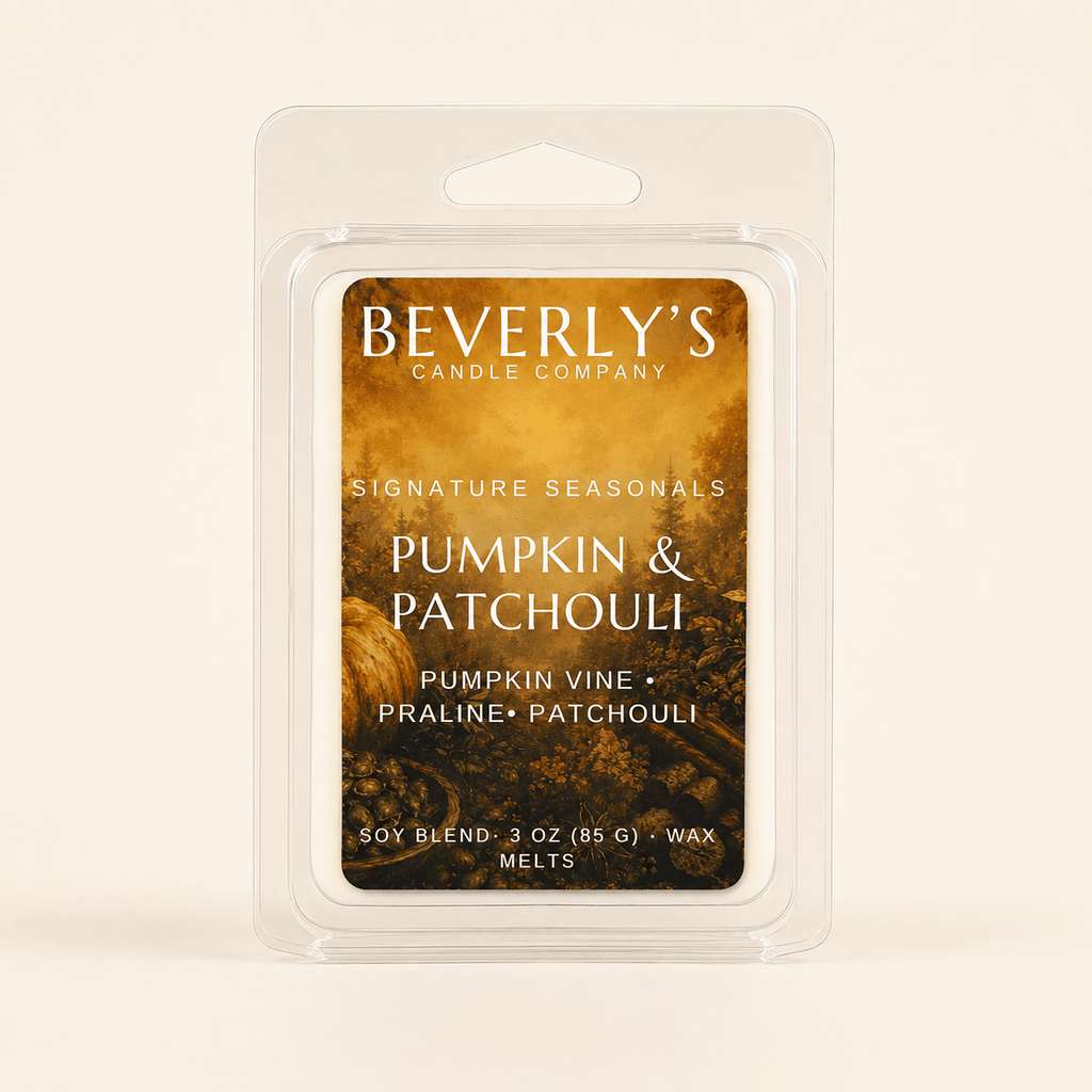 Pumpkin and Patchouli wax melt clamshell on a plain cream background, studio product shot